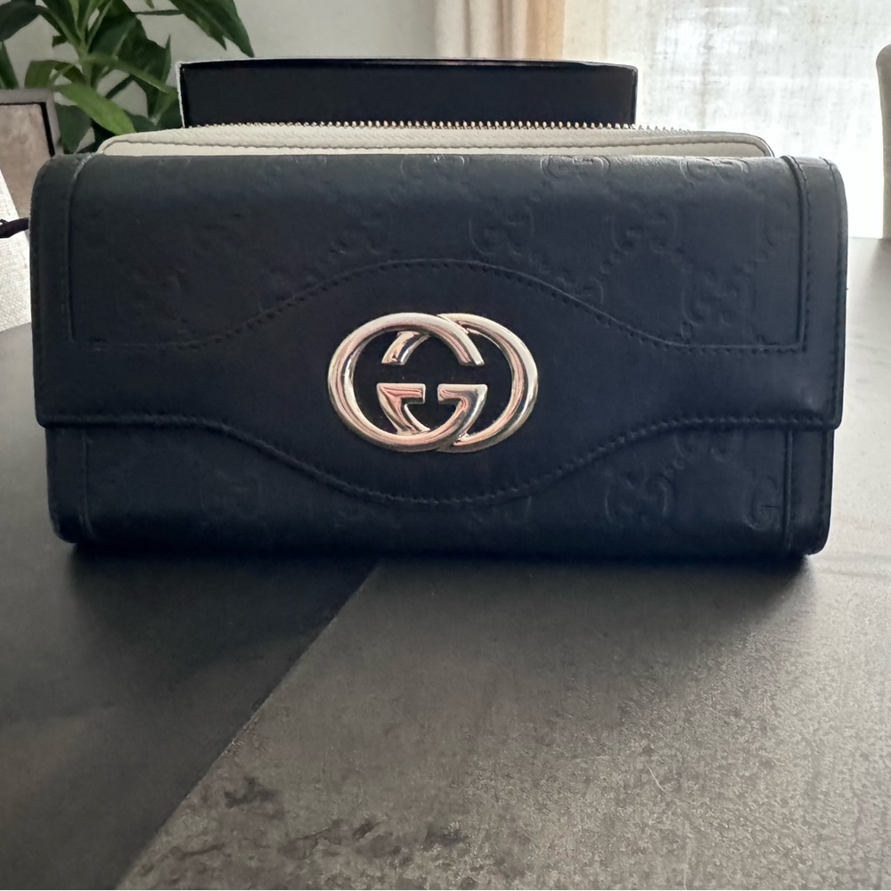 Authentic Gucci GG Embossed Wallet